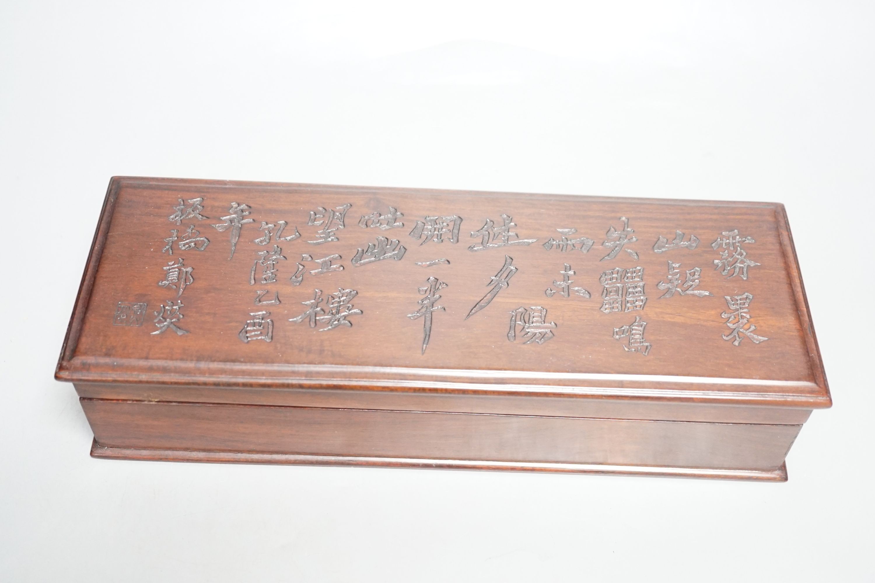 A Chinese hongmu box, inscribed with a Confucian poem, 28cms